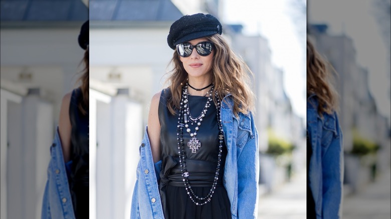 Woman wearing edgy black pearls