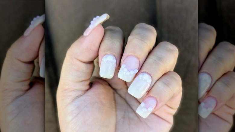 Pearl nail art on nails