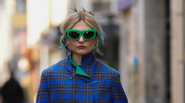 woman with blue and black ends and blonde hair