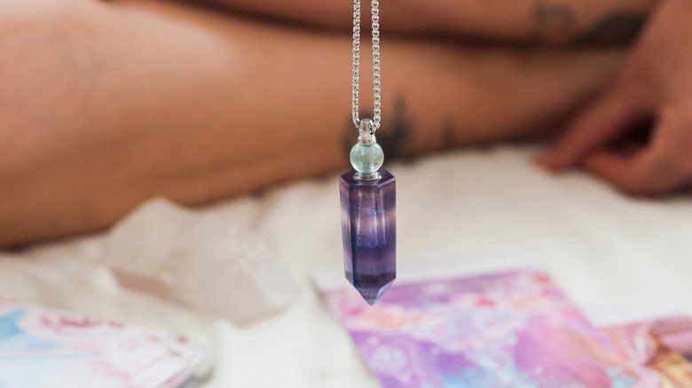 Amethyst pendulum close up 