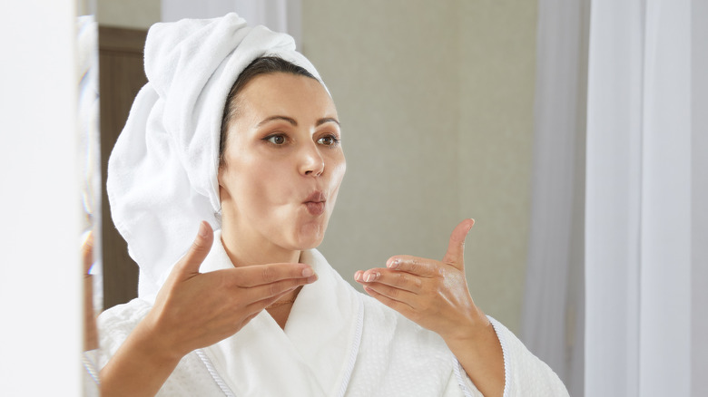 woman doing mouth exercises