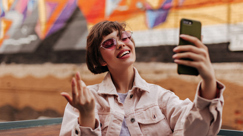 woman tilted head in selfie