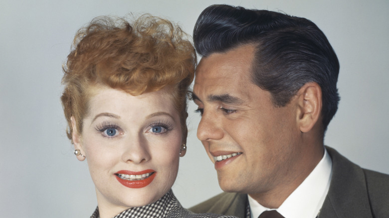 Lucille Ball and Desi Arnaz posing together