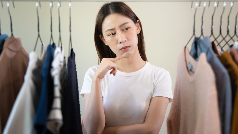 Woman choosing an outfit