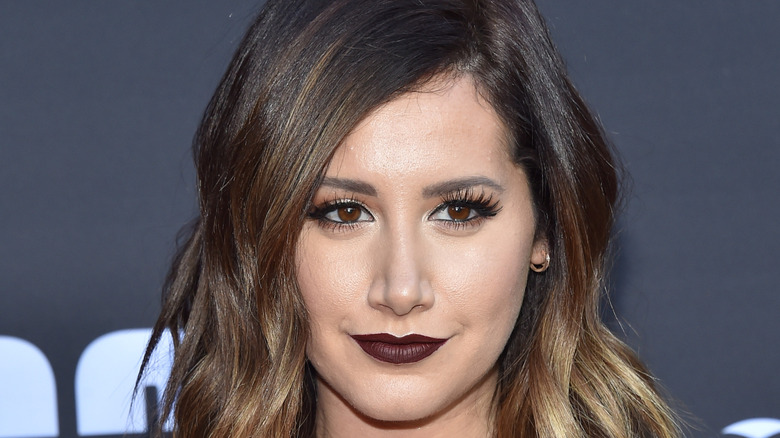 Ashley Tisdale with dark maroon lipstick
