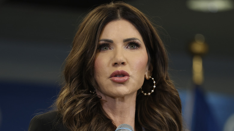 Kristi Noem with pearl hoop earrings