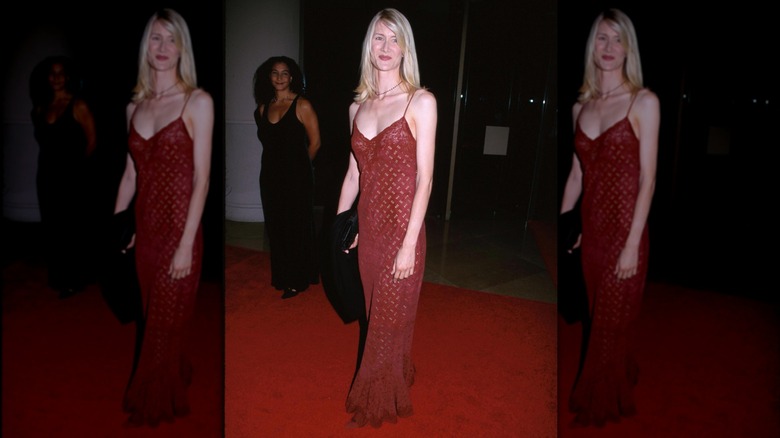 Laura Dern wears a red slip dress in to the Annual Moving Picture Ball in 1999