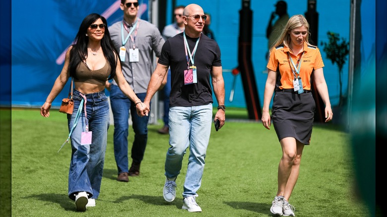 Jeff Bezos and Lauren Sánchez enter the F1 paddock as guests of McLaren F1 team during practice ahead of the F1 Grand Prix of Miami at Miami International Autodrome on May 5, 2023 in Miami, United States (2023)