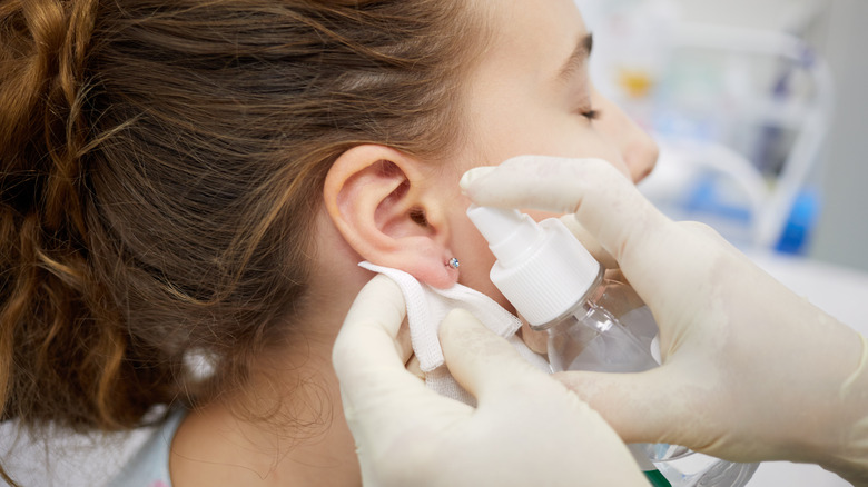 Cleaning pierced ear