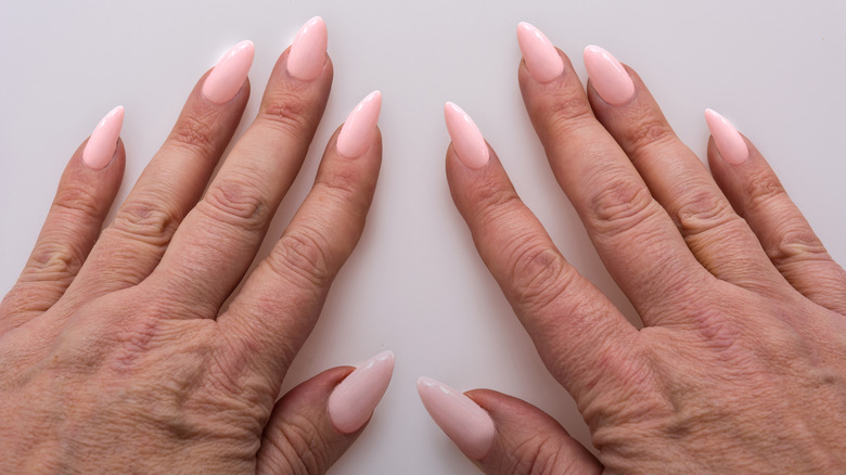 pointed nails on table