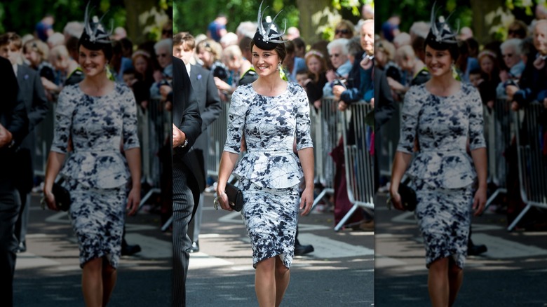 Pippa Middleton in a black-and-white dress walking on the road