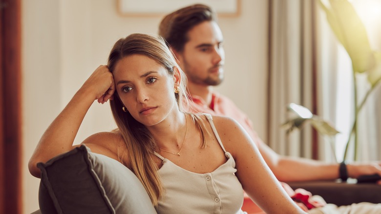 Unhappy couple facing away