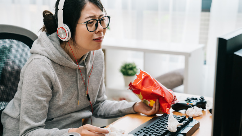 Woman crying at computer