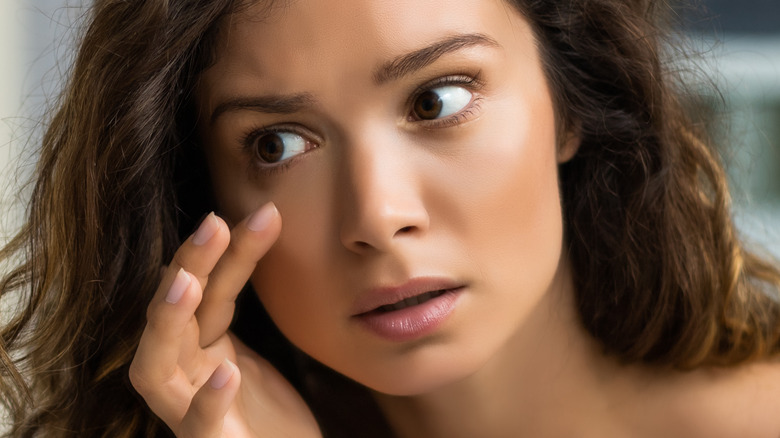 woman with swelling eyes