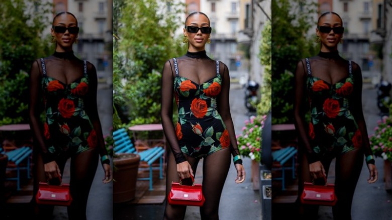 woman wearing a floral playsuit