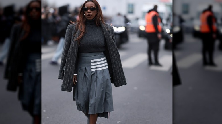 Woman in gray outfit