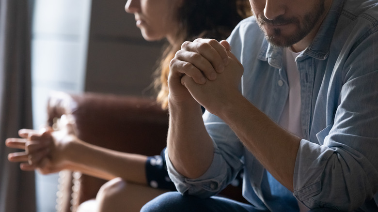 A couple sitting in counseling