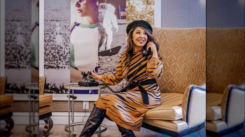 Woman wearing animal-print sweater dress