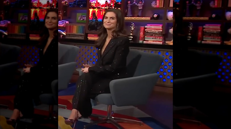 Kaitlin Collins speaks while sitting at "Watch What Happens Live"