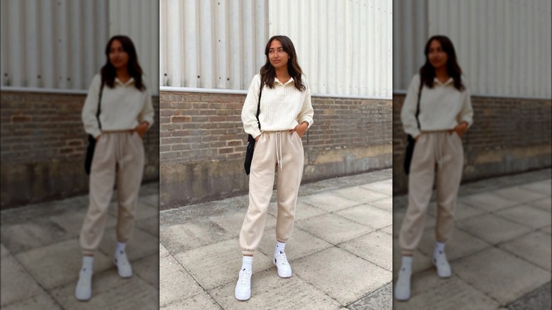 polo sweater paired with sweatpants