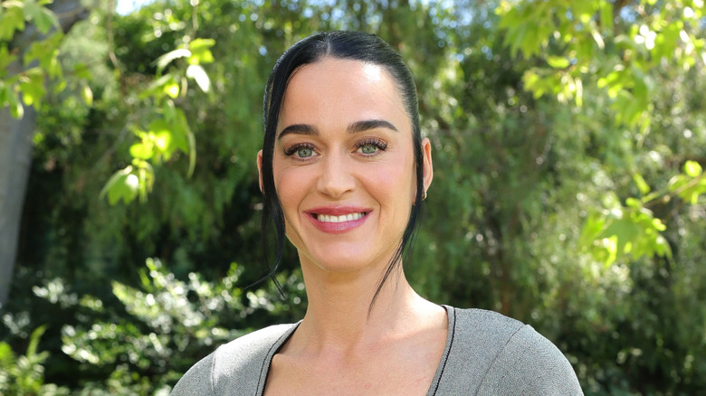 Katy Perry wearing a gray top
