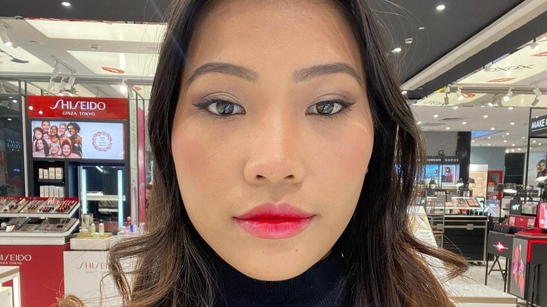 Girl wearing bright lipstick