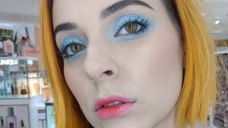 Girl wearing blue eyeshadow