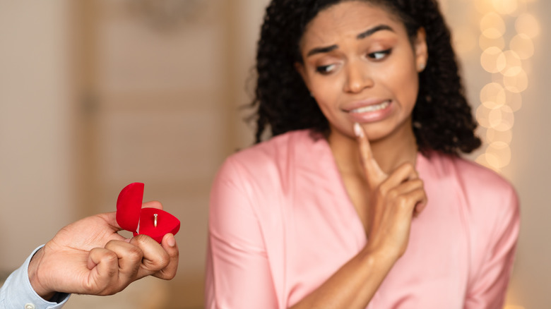 woman rejecting marriage proposal