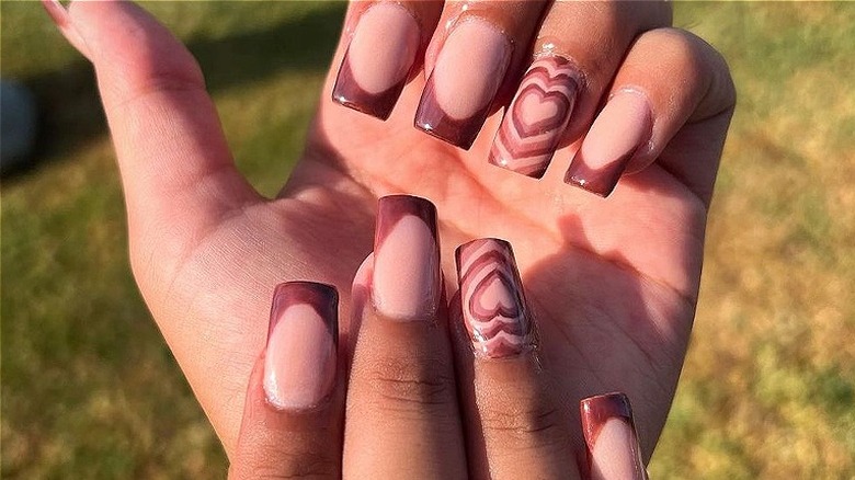 brown and white Powerpuff manicure