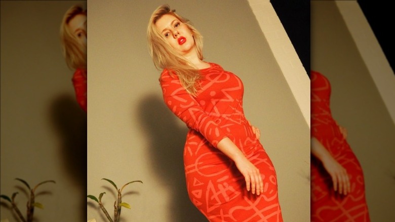 Symbolic orange column dress