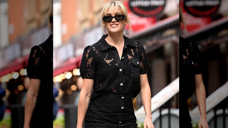 woman wearing black lace dress 