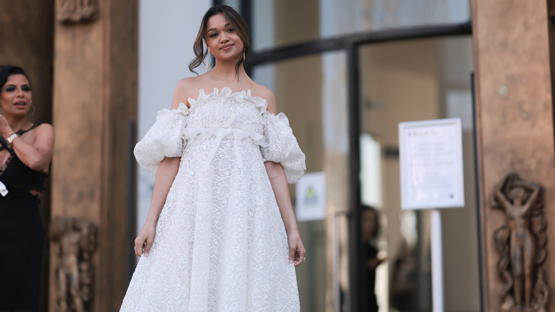 woman wearing dress with puffy sleeves