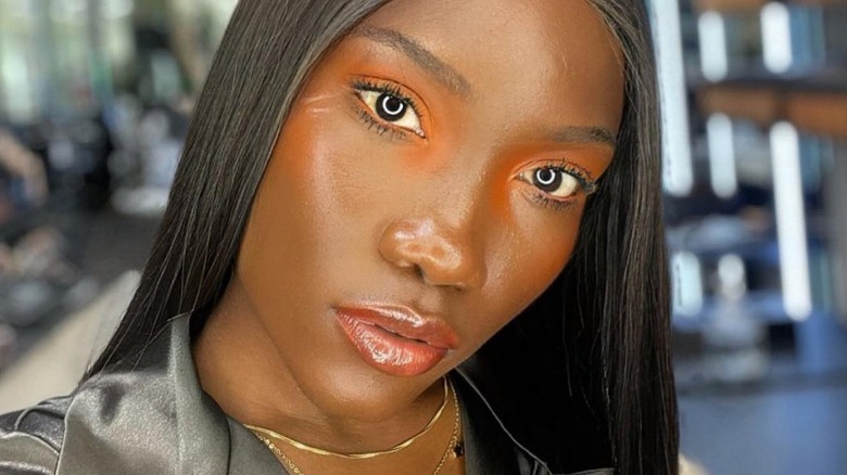Woman wearing orange blush