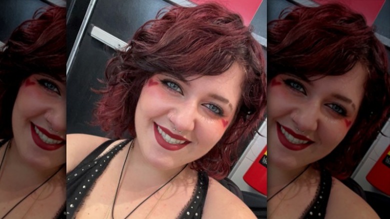 woman with black cherry hair