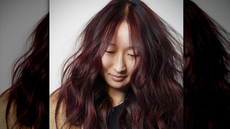 woman with Black cherry bangs