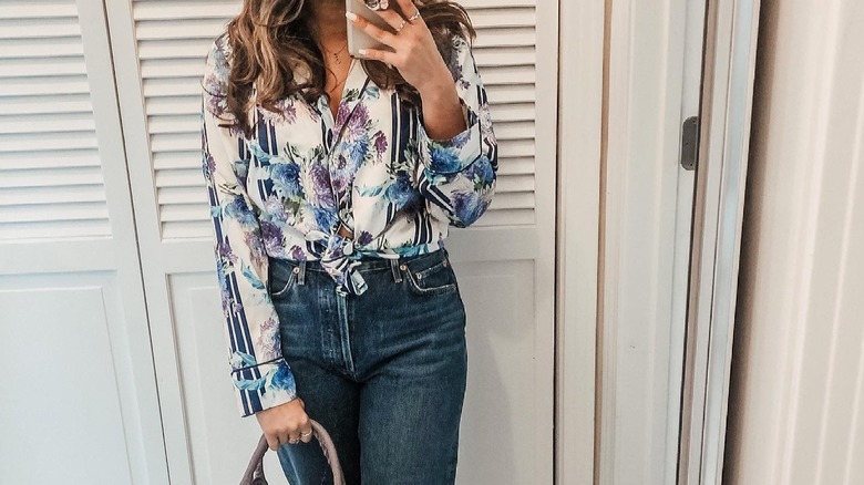 woman in dark-wash jeans