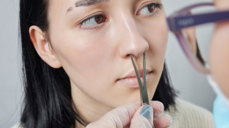 piercer clamping septum with forceps