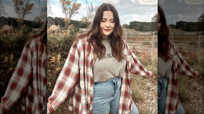 Woman wearing flannel shirt over tee
