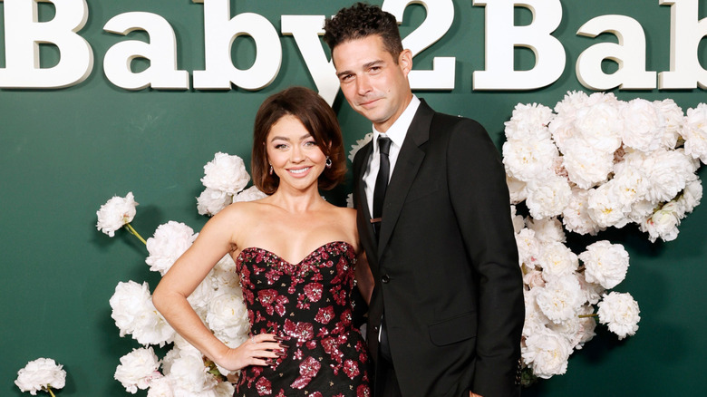 Sarah Hyland and Wells Adams smiling