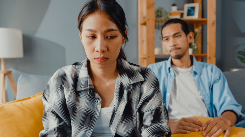 Woman sitting on a couch