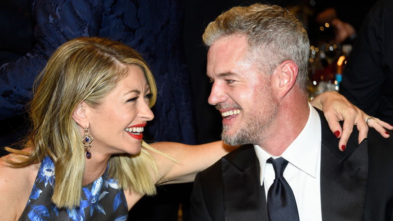 Rebecca Gayheart photographed with a hand on Eric Dane's shoulder at the 43rd AFI Life Achievement Award Gala
