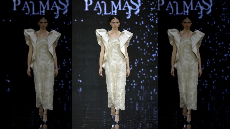 woman wearing puffed sleeve gown