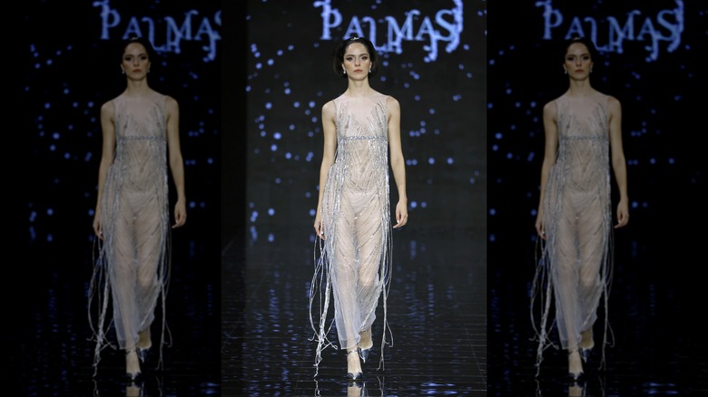 woman wearing embellished wedding gown