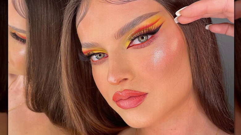 Yellow eyeshadow graphic eyeliner