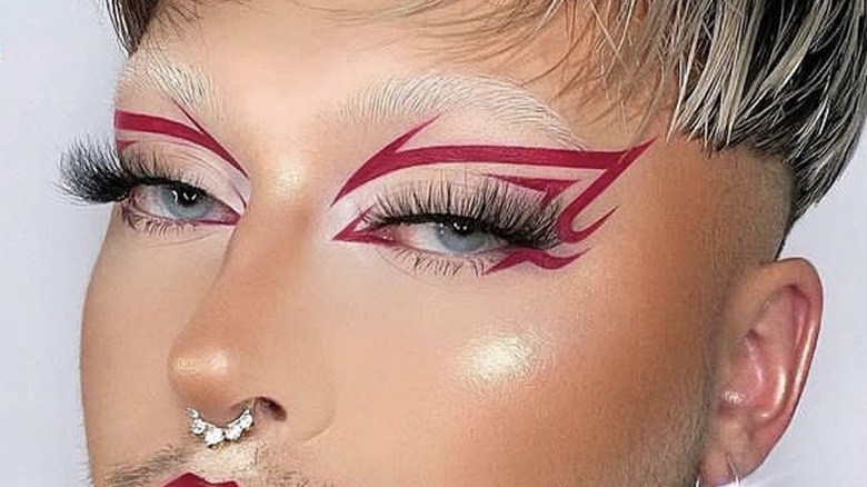 person with red graphic liner