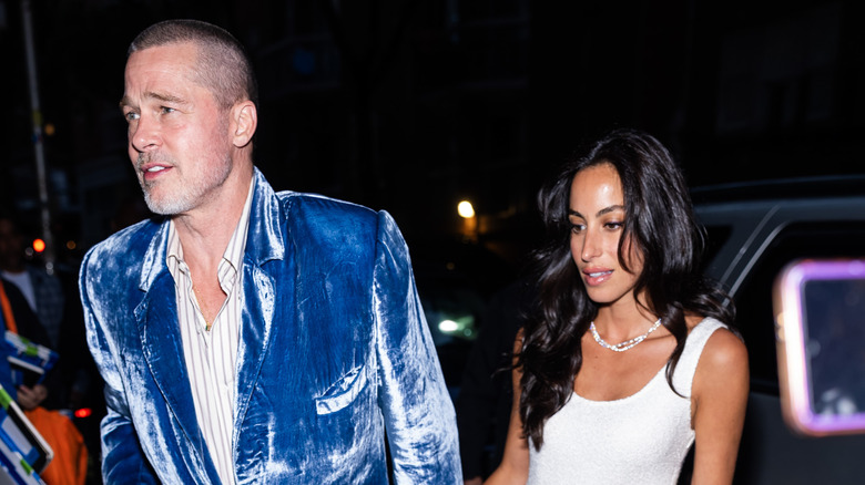 Brad Pitt and Ines de Ramon walking