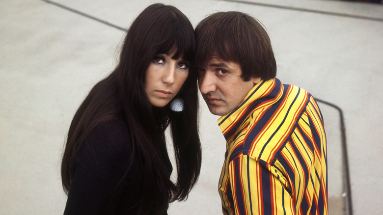 Cher and Sonny Bono looking at the camera