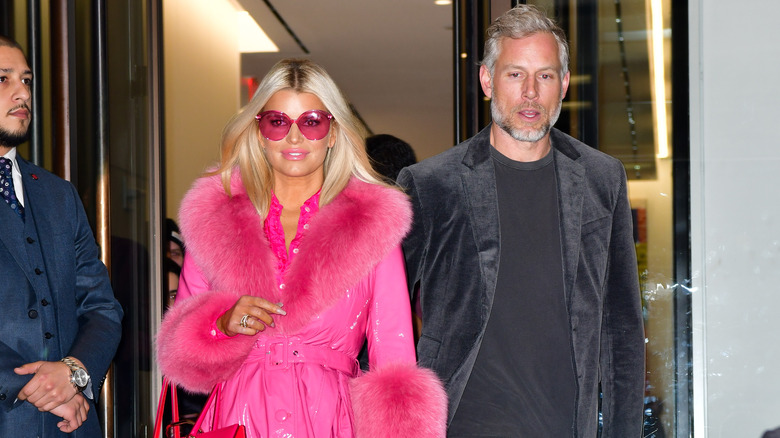 Jessica Simpson and Eric Johnson leaving a building together.