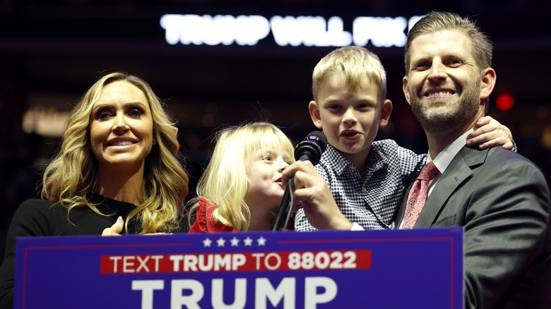 Eric and Lara Trump on-stage with their children at Donald Trump's victory rally in January 2025.