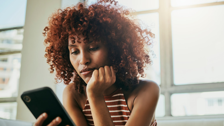 Woman looking at her phone